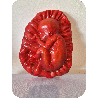 Fruto de la vida bajo relieve escultura