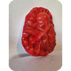 Fruto de la vida bajo relieve escultura