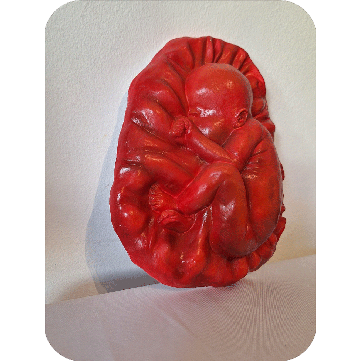 Fruto de la vida bajo relieve escultura